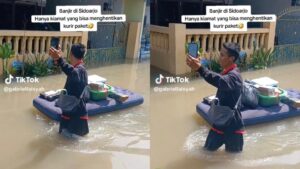 ‘Status bungkusan, sedang meredah banjir’